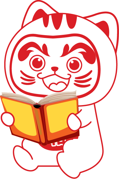 Linh vật Daruma đọc sách